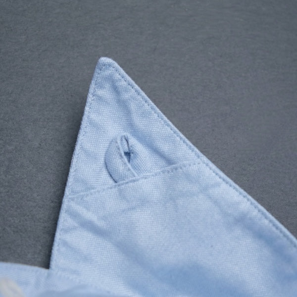 Col avec boutonnage sous patte